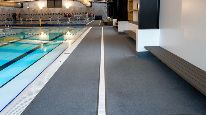 10mm pool grate integrated with Allproof domestic channel in a high-traffic wet zone