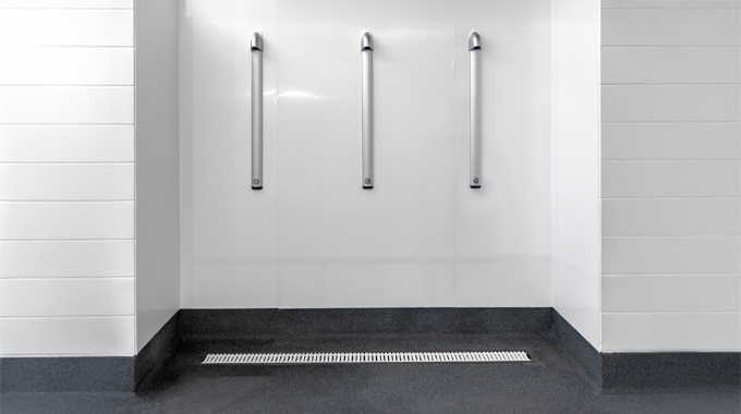 10mm pool grate integrated with Allproof domestic channel in a wet zone
