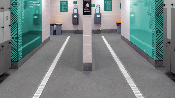 10mm pool grate integrated with Allproof domestic channel in a high-traffic wet zone