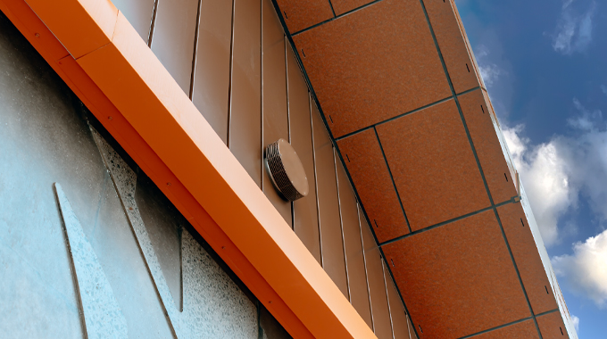 Stainless steel soffit cover for overflow pipe exit custom