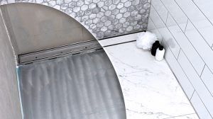 Tile-over-stainless-steel-shower-tray-base-wth-linear-channel-strip-drain