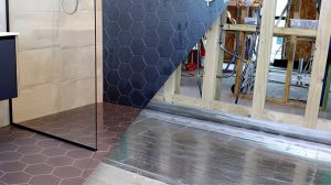Tile-over-stianless-steel-shower-tray-beachland-project