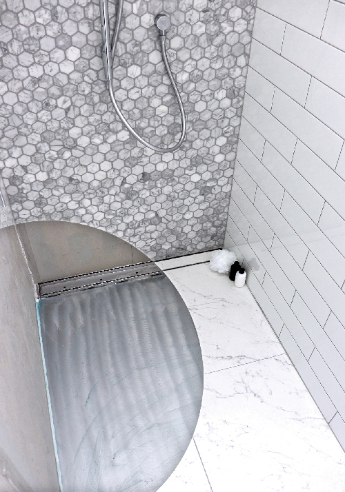 shower tray tile over stainless drain waste channel grate