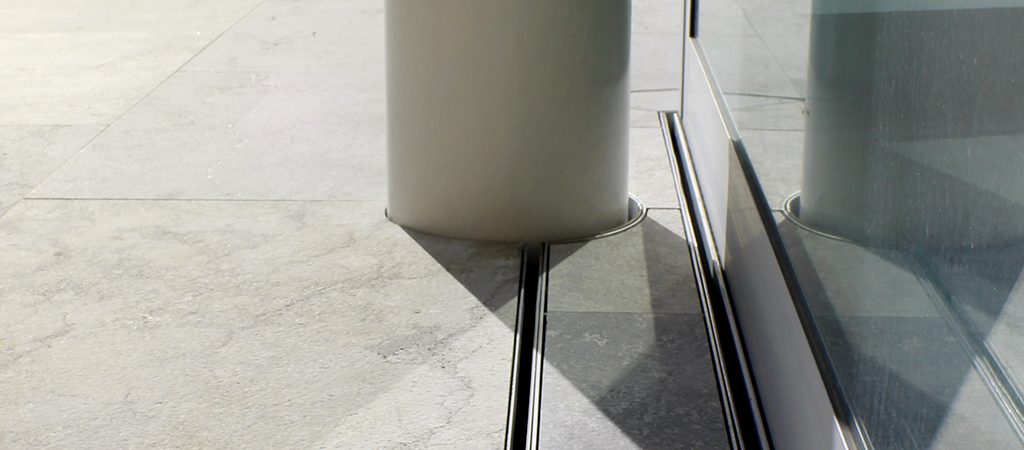 Level threshold channel strip drain install tile insert grate patio slider door joinery