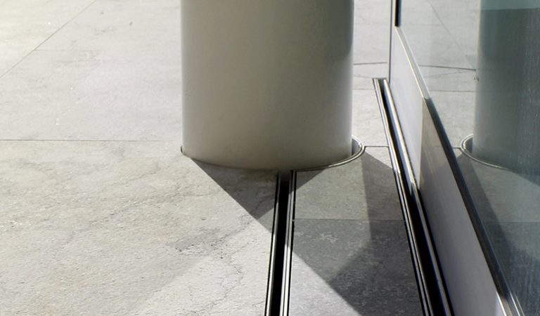 Level threshold channel strip drain install tile insert grate patio slider door joinery
