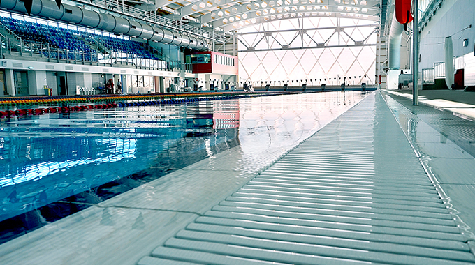 300mm Allproof pool grate handling overflow along pool perimeter with T-rail support