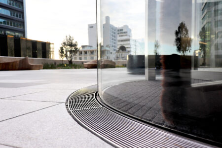 curved revolving door level threshold drain