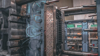 Allproof Commercial Channel being manufactured from 100% recycled PP in injection molding machine.