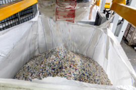 Cleaned and chipped PP collected from roadside recycling bins.