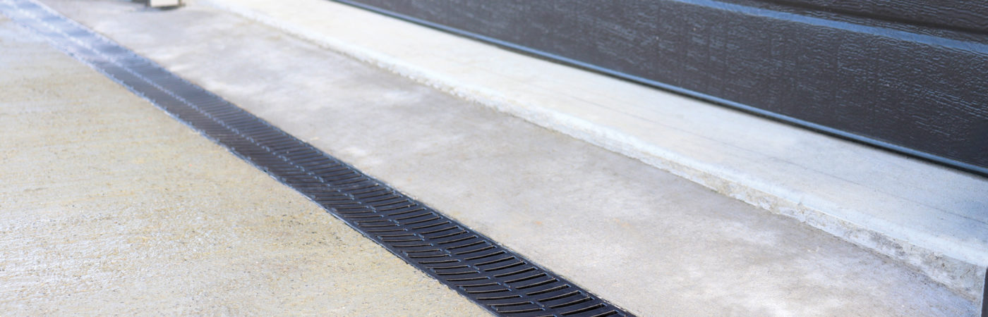 driveway drainage channel plastic grate water surface residential